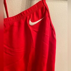 Watch out! Baywatch classic red swimsuit will have the boys drooling. Nike Large